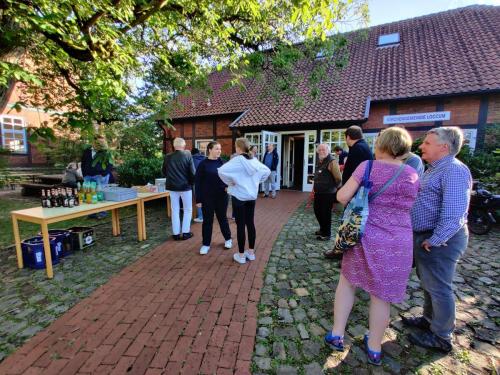 Arriving for social evening in Gemeindehaus, Loccum