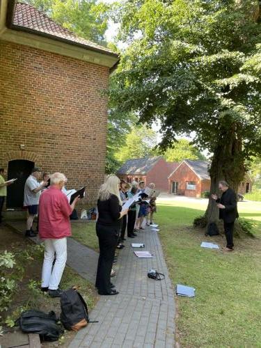 Rehearsing outside church in Gnarrenburg